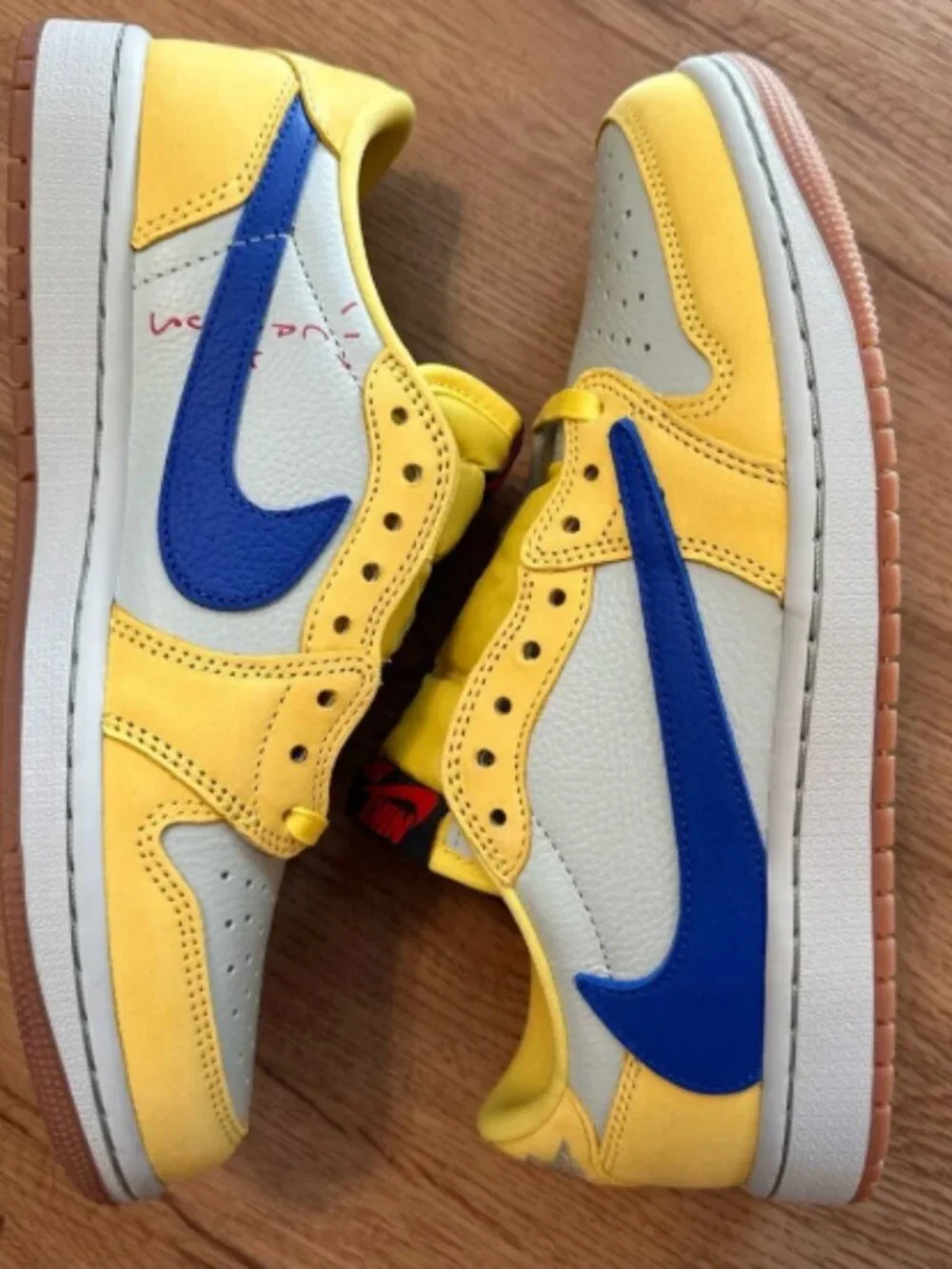 Air Jordan 1 Low OG x Travis Scott “Canary” Sneakers